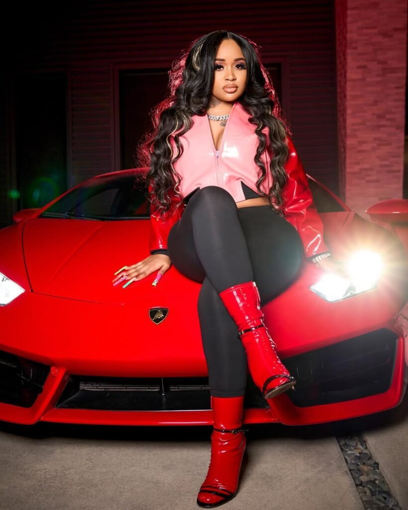 Stunna Girl with her lamborghini