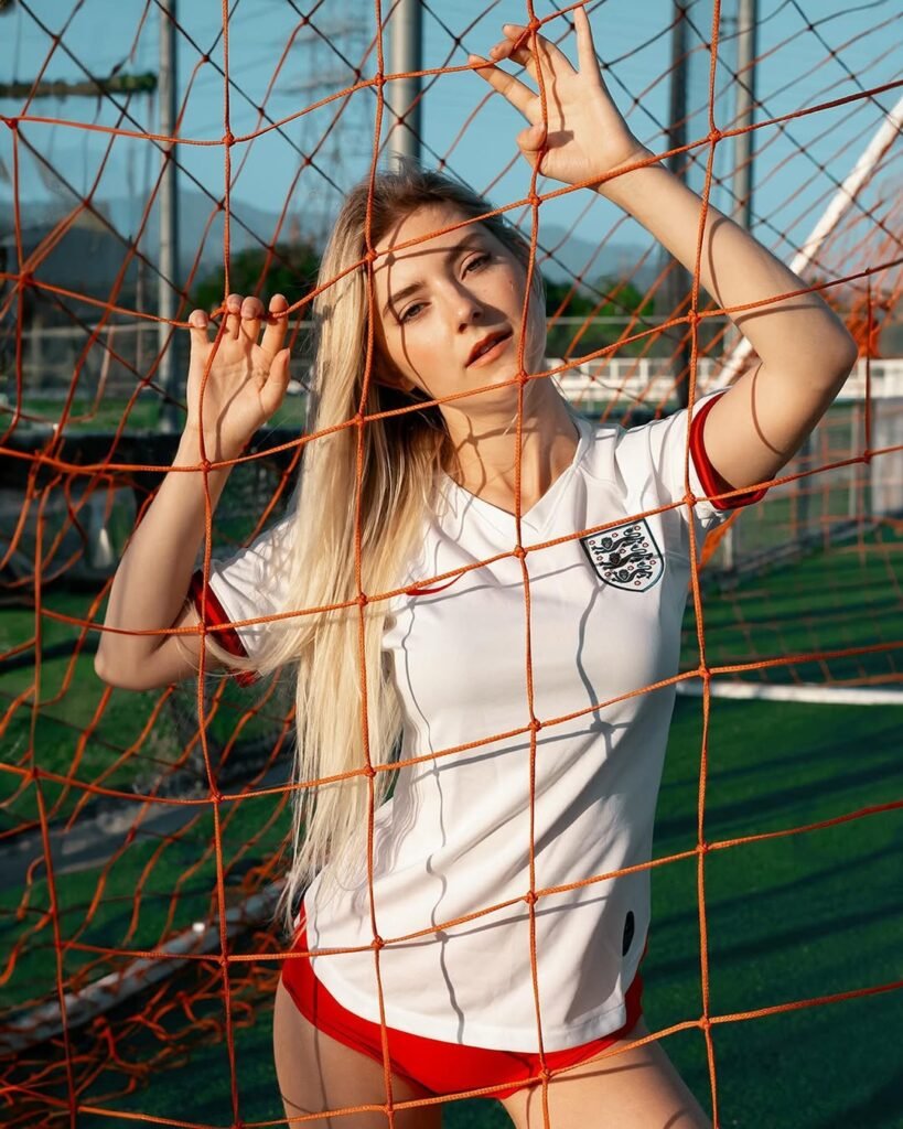 Eva Elfie football photoshoot