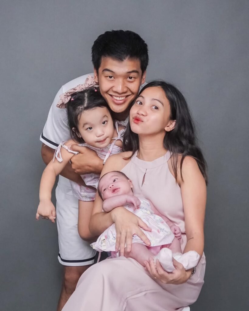 John Amores with his wife and daughter