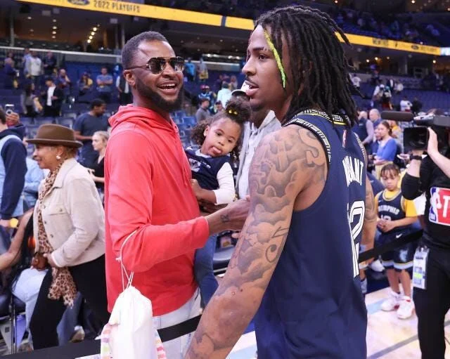 Tee Morant cheers for his son Ja Morant at NBA match